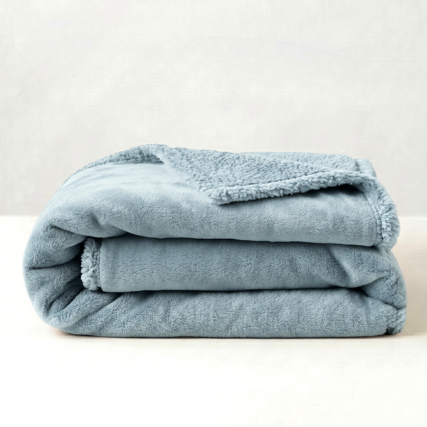 Folded cloud blue blanket