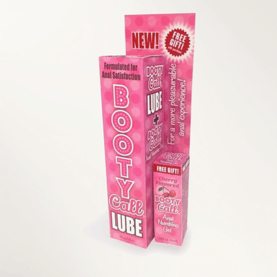 Pink boxed packaging for Booty Call Lube next to a smaller box for Booty Call Anal Numbing Gel against a light background.