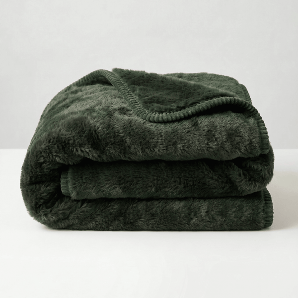 Folded dark green sex blanket fully waterproof with rounded corners easily washable