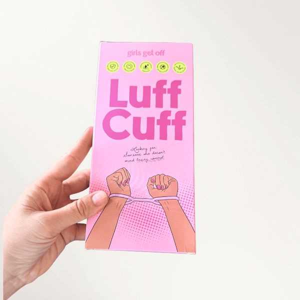 Hand holding Luff Cuff Packaging