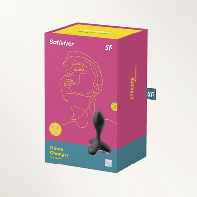 Pink packaging box for the Satisfyer Game Changer vibrating butt plug against a plain background.